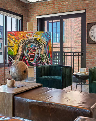 Nashville-themed living room with red velvet sofa and bar seating